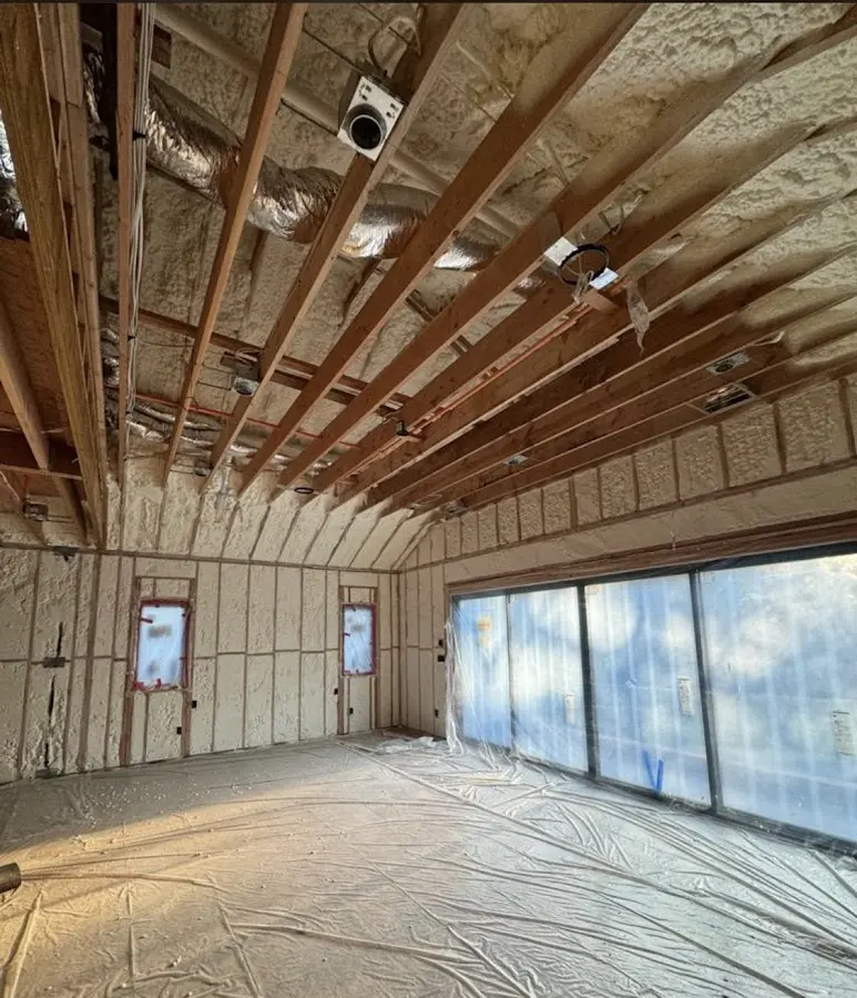 Interior walls and ceiling insulated with spray foam during new construction in Salida